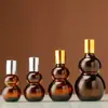 Botella cuentagotas de goma con cabeza de bulbo doble color té, botella para aceite esencial, botella cosmética, botella vacía para dividir esencia o emulsión, venta al por mayor