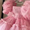 Vestido rosa de niña con gran lazo, vestido de princesa con mangas abullonadas y lentejuelas, falda de tul esponjosa para fiestas de cumpleaños y desfiles de damas de honor.