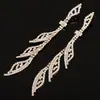 Pendientes europeos y americanos foto callejera pendientes largos de borla totalmente de diamantes moda coreana temperamento pendientes de comercio exterior incrustados de diamantes E389