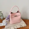 Bolso de Mano Sencillo Bolso Tote Pequeño para Mujer Primavera 2026 Nuevo Elegante Bolso Cubo para Viajes Diarios Bolso de Hombro Cruzado a la Moda