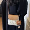 Bolsos Pequeños al por Mayor para Mujer 2025 Nuevo Estilo Invierno Bolso Cubo de Moda de Alta Gama Bolso Cruzado Versátil Casual de Gran Capacidad