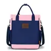 Nueva bolsa de tutoría para estudiantes con bloques de color estilo británico, bolsa cruzada impermeable de tela Oxford de gran capacidad para tutoría, bolsa de arte portátil