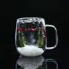 Taza de Vidrio Escena de Nieve Navideña Venta al por Mayor Transfronteriza Regalos Navideños Taza con Rama de Pino Escena de Nieve Navideña Taza de Doble Pared de Alto Borosilicato
