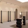Estante de exhibición para tienda de ropa estante de isla de acero inoxidable perchero de hierro negro accesorios de exhibición de ropa soporte de suelo simple