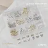 Joias para Nail Art Laço de Metal Fita de Ballet Gravata Borboleta Recortada Liga de Metal Acessórios para Unhas Caixa com 12 Compartimentos