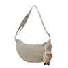 Bolsa Transversal Explosiva Feminina Transfronteiriça 2024 Nova Bolsa de Lona de Nylon Formato Bolinho Versátil de Ombro de Alta Qualidade Pequena Bolsa de Pano