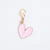 Colgante de historieta rosa con goteo de aceite, colgante de aleación en tono rosa, accesorios para manualidades, llavero decorativo, accesorios al por mayor