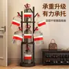 Cabide de roupas giratório, design de chão para uso doméstico, estilo simples, adequado para quartos e salas de estar, com três níveis para pendurar roupas e guardar bolsas