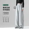 Calça feminina amarela clara de perna curva estilo primavera e outono 2026 nova solta com caimento estilo preguiçoso para baixinhas calça de perna larga