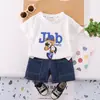 Ropa infantil transfronteriza traje para niños maletín sombrero oso traje de manga corta cuello redondo Mezclilla shorts de moda ventilador comercio exterior al por mayor moderno