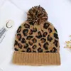 Nuevo gorro de punto de invierno al por mayor versión coreana del gorro de lana de leopardo bola directa cálido grueso en stock