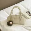 Bolsa de Ombro Fashion Retrô Feminina 2026 Nova Tendência Início do Outono Cor Sólida Pequena Quadrada Estilo Coreano Alto Valor Bolsa de Ombro Único