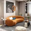 Área de descanso tienda de vestidos de novia de anacardo sofá de piel de cordero apartamento pequeño salón de belleza mitad tela tecnología sala de estar nórdico con forma de arco
