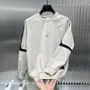 Sudadera casual de cuello redondo estilo americano para hombre, diseño color block otoño/invierno, versátil, corte holgado, prenda básica de manga larga moderna nueva