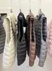 26 Otoño/Invierno Nuevo Estilo Europeo Chaleco de Plumas con Capucha de Canalé Oversize 90% Plumón de Pato Blanco Sin Mangas Abrigo Cálido