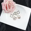 Al por mayor Versión Coreana Creativo Patrón de Trébol de Cuatro Hojas Incrustado con Diamante Aleación Collar Pulsera Colgante Joyería Accesorios DIY
