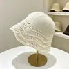 Nuevo sombrero de punto de color liso, versátil y simple, sombrero tipo cubo hueco fino de otoño e invierno para mujer, fábrica de sombreros tipo cubo cálidos