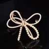 Broche de Perlas y Lazo Nuevo, Elegante y con un Toque de Alta Gama, Lujoso y Exquisito, Pin Versátil