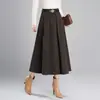 Saia de lã lisa estilo novo, acima do joelho, estilo guarda-chuva, para mulheres, outono 2026, nova saia plissada de comprimento médio, linha A