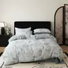 Nuevo juego de ropa de cama de cuatro piezas de gasa doble estampada, grado A, apto para bebés y madres, ropa de cama tejida estampada de doble capa para todas las estaciones