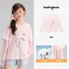 Ropa infantil Pudding Haru, camiseta de algodón auténtico de dos piezas falsas, nuevo estilo verano 2026, mangas a cuadros de retazos para niñas con estampado de dibujos animados
