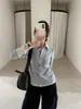 Han Xun, roupa de trabalho inteligente e estilosa: patchwork listrado, gola de camisa falsa de duas peças, top emagrecedor para mulheres, coleção outono/inverno 2026, estilo 27611