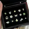 Colección de Brazaletes de Oreja Verde Fresco de Primavera: Aretes de Acero de Titanio Color Verde Menta Transparente con Aretes de Trébol de Cuatro Hojas Microincrustados