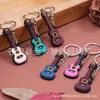Chaveiro de Silicone de Instrumentos Musicais PVC Guitarra Guzheng Presente Criativo Presente para Atividades Pequeno Presente Pingente Presente Atacado