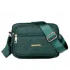 Bolsa Feminina Nova de Ombro Único para Primavera Crossbody Commute Bolsa para Celular e Moedas Tecido de Nylon Horizontal Quatro Zíperes Bolsa de Ombro Feminina