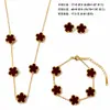 Nuevo Conjunto de Tres Piezas de Lujo de Nicho de Alta Gama, Collar, Pulsera y Pendientes de Acero de Titanio con Trébol de Cinco Hojas de Doble Cara para Mujer, Venta al por Mayor Transfronteriza
