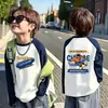 Camiseta de manga larga para niño de algodón puro con bloques de color, capa base para primavera/otoño, nuevo top raglán estampado elegante y versátil para niños