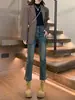 Diseño jeans rectos para mujer 2024 primavera nuevos de cintura alta elásticos pantalones baguette pantalones de tubo con abertura pequeña