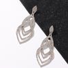 Pendientes de novia transfronterizos, ligeros, de lujo, de alta gama, de estilo europeo y americano, con temperamento exagerado, pendientes de taladro de viento para mujer, venta al por mayor