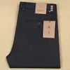 Calça masculina de algodão stretch poliéster espesso regular para outono e inverno, cintura reta, calça casual de negócios em liocel
