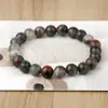 Pulsera Estilo Chino Nuevo Pulsera de Piedra de Sangre Natural Pulsera Elástica Tejida a Mano Pura Joyería Más Vendida para Hombres y Mujeres Venta al por Mayor