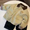 Chaqueta de primavera y otoño para niños 2026 nueva elegante casual bloques de color solapa cortavientos chaqueta de bebé top moderno