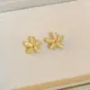 Pendientes de Piedra Ojo de Gato con Forma de Pétalo 2025 Nuevo Estilo Caliente Pendientes Pequeños Simples Elegantes Diseño para Mujer Pendientes de Alta Gama para Mujer