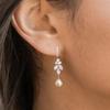 Pendientes largos de perlas de lujo elegantes transfronterizos de Cao Shi, nuevos pendientes de cara delgada para dama, pendientes de gancho colgantes
