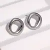 Pendientes geométricos minimalistas de acero inoxidable de moda transfronterizos, diseño circular simple, pendientes únicos y exquisitos de acero de titanio para mujer