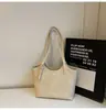Bolsa Transfronteriza Simple Casual de Gran Capacidad para Mujer Nueva Moda Nicho Bolso Tote para el Trabajo Versátil Bolso de Hombro Único para el Brazo