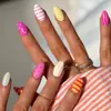 Uñas postizas tipo macaron largas con forma de almendra con lunares contrastantes y rayas horizontales, parches de uñas postizas para chicas dulces al por mayor