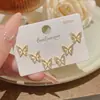Versión Coreana Aguja de Plata S925 Una Tarjeta Tres Pares de Aretes Iridiscentes, Sensación de Lujo Ligero de Alta Gama, Aretes Nicho Versátiles Frescos de Verano