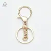 En stock Set de tres piezas con cierre de mosquetón bañado en rodio con anilla en O Cadena de cuatro secciones Anillo plano Joyería Figuras Bolsas Llaveros Colgantes