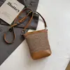 Bolsa Pequena Tipo Balde Bicolor Simples para Mulheres Primavera/Verão 2026, Bolsa Transversal Casual Versátil, Leve para o Dia a Dia, Bolsa de Ombro Pequena