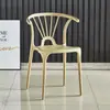 Silla de comedor nórdica sencilla de plástico, respaldo para el hogar, alquiler de sillas de plástico, silla de comedor Taishi para exteriores.