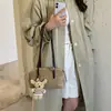 Bolso de Bowling Retro de Nicho Transfronterizo para Mujer 2026 Nuevo de Alta Calidad Gran Capacidad para el Viaje Diario Bolso de Axila