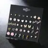 Amazon Lindo Conjunto de Pendientes de Animales de Aleación de Nicho Pendientes de Corazón Oso Conejo Exquisitos Pendientes Pequeños para Mujer