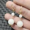 Xinjiang Hetian jade branco brincos de jade de contas redondas jade branco gordura de carne jade banhado a ouro brincos de jade femininos atacado de fábrica