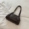 Bolso casual de gran capacidad para mujer para el trabajo y los desplazamientos, nuevo de otoño 2026, estilo motocicleta, moda, color liso, bolso de hombro