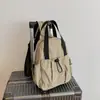 Bolso de Pecho Ligero Nuevo Transfronterizo, Mochila Multifuncional Impermeable con Cordón para Mujer, Bolso Cruzado Simple y Elegante